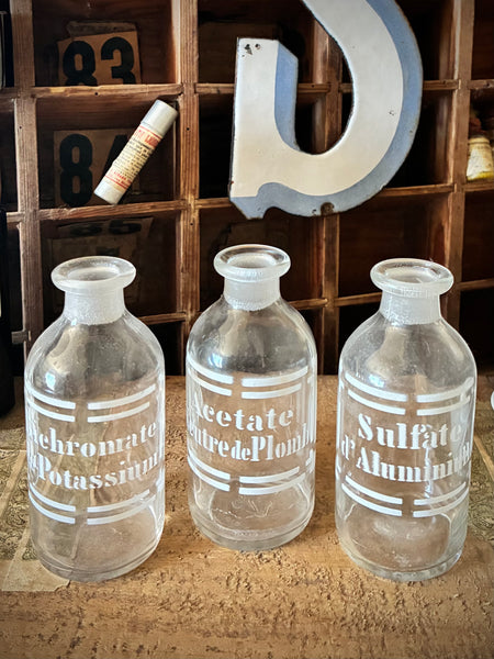 Three antique blown-glass pharmacy bottles, 19th early 20th centuries. LOT N°1