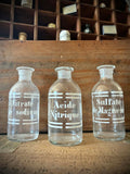 Three antique blown-glass pharmacy bottles, 19th early 20th centuries. LOT N°3